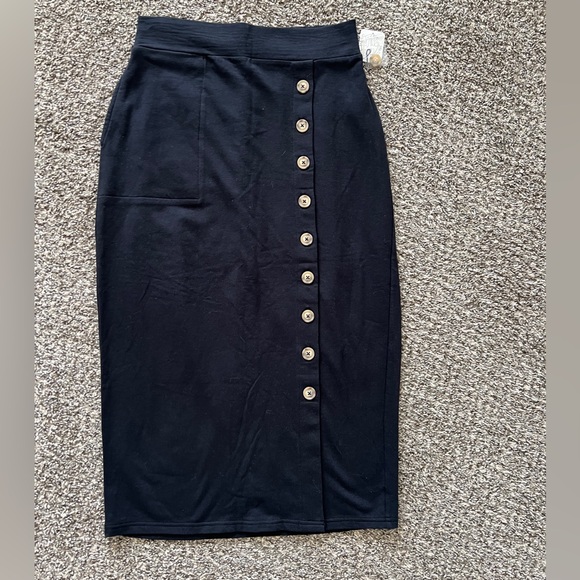 Free People Dresses & Skirts - Elegant Black Free People Button-Down Skirt